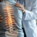 Patient receiving chiropractic spinal adjustment at Elite Spine & Health Center in Spring Texas