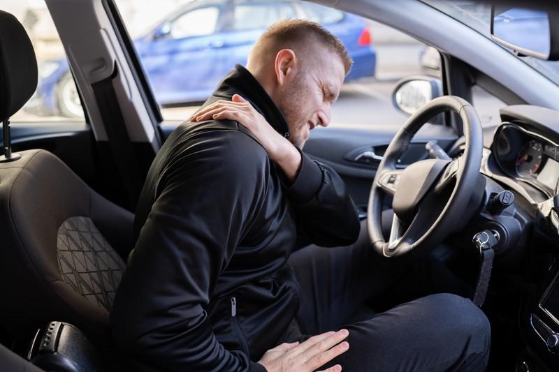 car-driver-back-pain-injury_81619527