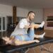 patient-doing-physical-rehabilitation-helped-by-therapists_21539744