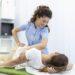 young-woman-doctor-chiropractor-osteopath-fixing-lying-womans-back-with-hands-movements-visit-manual-therapy-clinic-professional-chiropractor-work_27156508.jpg