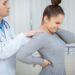 young-woman-suffering-from-back-pain-having-her-spine-examined-by-experienced-doctor_9507626.jpg